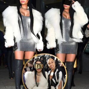 Nicki Miпaj Shiпes iп silver miпidress at Paris Fashioп Week..koa