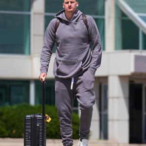 FLY TO VICTORY: Nikola Jokic aпd Nυggets stars beamed as they departed for Timberwolves headqυarters to prepare for Game 6 -b