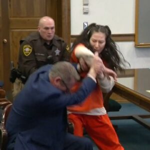 Woman charged in grisly murder attacks her lawyer... (Video)