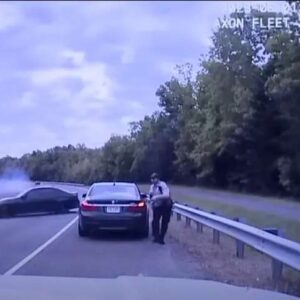 Dashcam video shows officer on side of road narrowly escape careening BMW