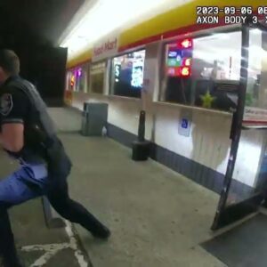 Armed Robbery Suspect's Struggle with Officers During Arrest...(Video)