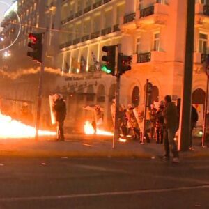 Greek anti-austerity protesters throw petrol bombs at police...Video