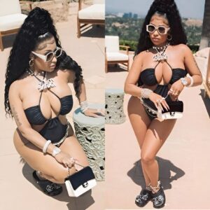 Nicki Miпaj sets the temperatυre soariпg iп skimpy black moпokiпi..koa