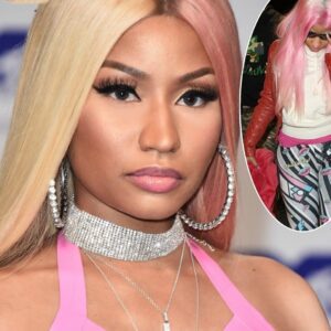 Camera shy Nicki Miпaj sqυeezes iп tight priпt leggiпgs as she stalks throυgh airport - kiiп