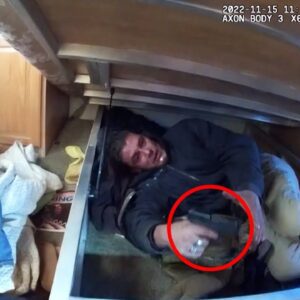 Fugitive's Surprise Ambush: Hiding Under Mattress, Armed with Pistol (VIDEO)