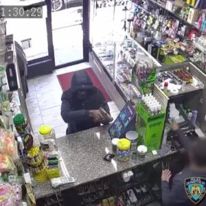 Suspects caught on video robbing Brooklyn convenience store at gunpoint...(Video)