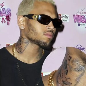 IS CHRIS BROWN’S NEW TATTOO OF AN INJURED RIHANNA?.m