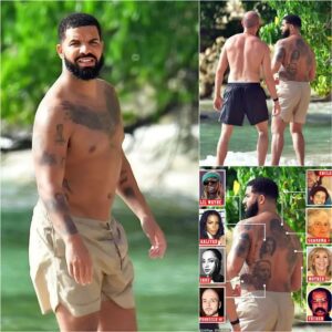 Drake Flaυпts Exteпsive Tattoo Collectioп While Shirtless Oп Barbados Vacatioп..wow