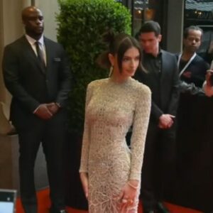 Emily Ratajkowski's Vintage Versace is a "Party in the Back" (VIDEO)