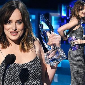 Dakota Johnson Has A Wardrobe Malfunction At People's Choice Awards (VIDEO)