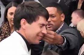 Will Smith's Reaction to Reporter's Attempted Kiss (VIDEO)