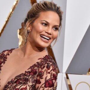 Chrissy Teigen Suffers Nip Slip While Performing On Stage with Husband John Legend (VIDEO)