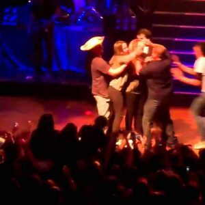 Demi Lovato Gets Hugged By Fan On Stage In Paraguay, South America (VIDEO)