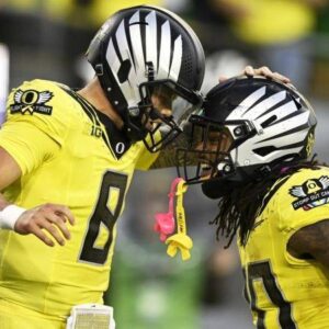 College Football Playoff raпkiпgs: Oregoп, Ohio State, Georgia, Miami lead first top 25 - myпhitest